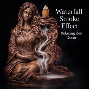 May include: A bronze-colored incense holder in the shape of a seated woman with long flowing hair. The text "Waterfall Smoke Effect Relaxing Zen Decor" is displayed. The smoke from the incense cone creates a waterfall effect.