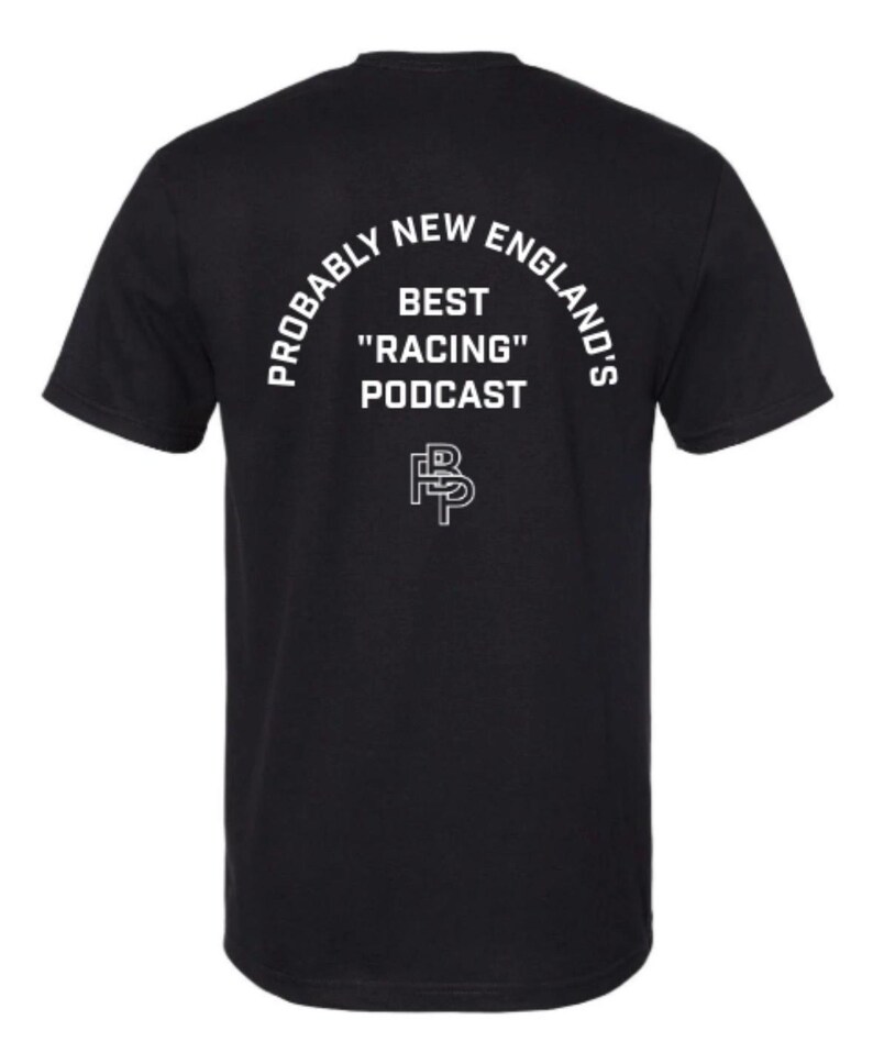 May include: Black t-shirt with white text. The text reads "Probably New England's Best "Racing" Podcast" in an arched layout. Below the text is a stylized "FP" logo.