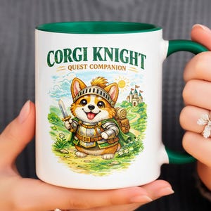 May include: White ceramic mug with a green handle and interior rim. The mug features a cartoon illustration of a corgi knight with the text "CORGI KNIGHT QUEST COMPANION". The corgi is wearing armour and holding a sword.