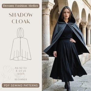 May include: A woman wearing a dark gray hooded cloak with a silver clasp, paired with a black dress and boots. The image includes a line drawing of the cloak and text that reads "SHADOW CLOAK" and "PDF SEWING PATTERNS".