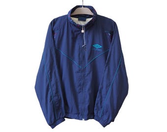 Vintage UMBRO trainingsjack met volledige ritssluiting, maat L, blauw, sportief windjack met klein logo, jaren 2000, sportieve stijl, casual, lichtgewicht, sportkleding