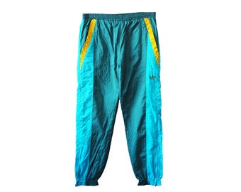 Vintage Adidas trainingsbroek maat M, retro sportbroek met Trefoil-logo, zeldzaam, jaren 90, sportieve stijl, casual, lichte kleding, sportkleding.