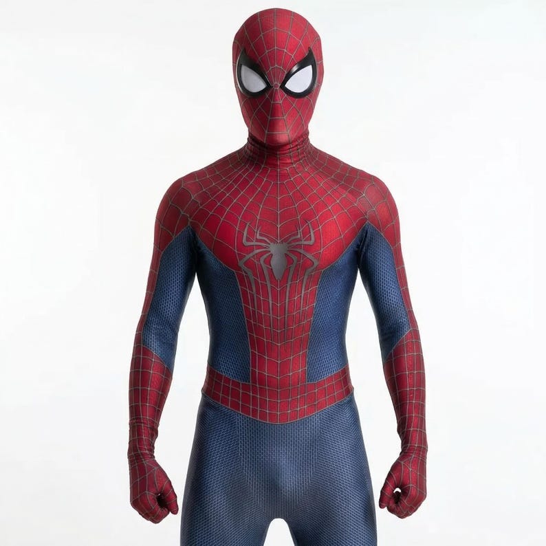 May include: A full-body Spider-Man costume in red and blue. The costume features a red mask with white eye lenses, a red torso with a black spider emblem, and blue sections on the arms and legs. The suit has a web pattern.