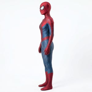 May include: A full-body Spider-Man costume in red and blue. The costume features a red mask with white eye lenses, a red torso and arms, and blue legs. The suit is form-fitting and appears to be made of a flexible material.