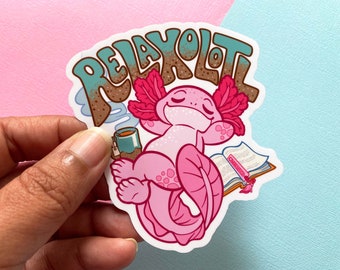 May include: A pink axolotl with closed eyes is relaxing with a cup of tea and a book. The axolotl is surrounded by a brown and green background with the word "RELAXOLTL" written in large letters.