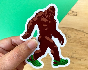 VS120 Bigfoot Wearing Crocs Vinyl Sticker / Funny Sasquatch in Clogs Decal / Cryptid Humor