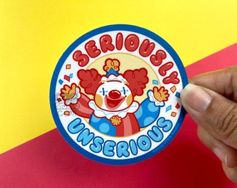 May include: A blue and white circular sticker with a cartoon clown wearing a red and white costume. The clown is waving and has a big smile. The text "SERIOUSLY UNSERIOUS" is written around the clown in a white outline.