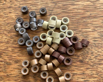Microperlas revestidas de silicona: Perlas de engarce para extensiones de cabello