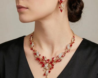 Conjunto de collar y pendientes de oro con flores y cristales rojos, joyería nupcial llamativa.