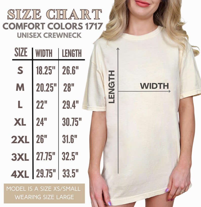 May include: Cream-colored unisex crewneck t-shirt with a size chart. The chart displays measurements in inches for sizes S through 4XL. The text on the chart reads "SIZE CHART COMFORT COLORS 1717 UNISEX CREWNECK". The model is wearing a size large.