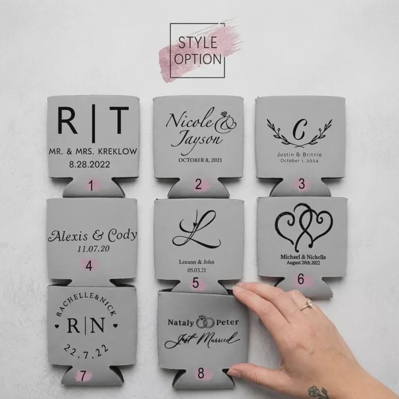 May include: Eight light gray foam can coolers arranged in a grid, each featuring unique black printed designs including names, dates, monograms, and wedding-themed graphics. Each cooler is numbered one through eight for style selection purposes.