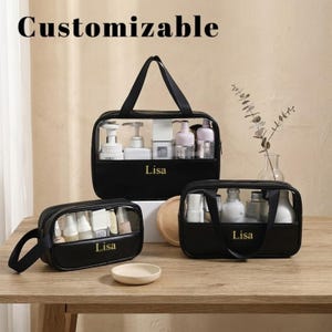 May include: Black and clear cosmetic bags with the word "Lisa" printed in gold. The bags are filled with various cosmetic products. The word "Customizable" is printed at the top of the image.