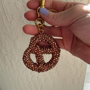 Bedazzled pretzel bag charm