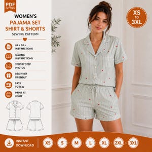 May include: A sewing pattern for a pyjama set consisting of a short-sleeved button-down shirt and shorts. The garment features a light green and white vertical striped fabric with small red heart prints, a notched collar, and white piping.