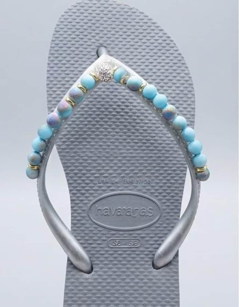 Havaianas Silver flip flops w blue beading size 6 W image 1