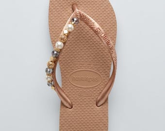 Havaianas gold flip flops w pearl and gold beading. W 7/8