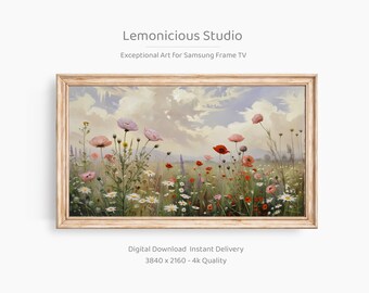 May include: A framed digital art print depicting a colourful meadow. The artwork shows a field of wildflowers in pink, red, and white, set against a cloudy sky. The frame is a light wood colour. Text on the image reads "Lemonicious Studio" and "Exceptional Art".