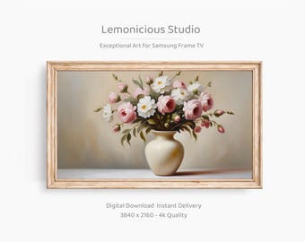 May include: Digital artwork depicting a vase of pink and white roses with green leaves, set against a neutral backdrop. The vase is cream-colored. The image is framed in a light wood frame. Text on the image reads "Lemonicious Studio" and "Exceptional Art for Samsung Frame TV."