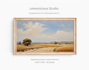 May include: A landscape painting in a wooden frame, depicting a wheat field, trees, and a blue sky with clouds. The artwork is from "Lemonicious Studio" and is described as "Exceptional Art For Samsung Frame TV."