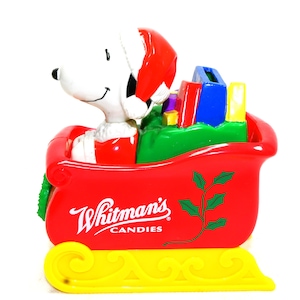 Salvadanaio di plastica festivo del 1998 con Snoopy e Woodstock sulla slitta di Babbo Natale