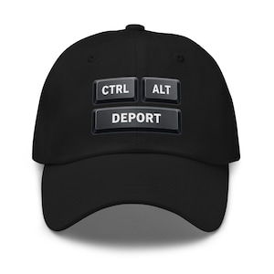 May include: Black baseball cap with the words "CTRL", "ALT", and "DEPORT" printed in white. The cap has a curved brim and a button on top. The text is arranged to resemble computer keyboard keys.