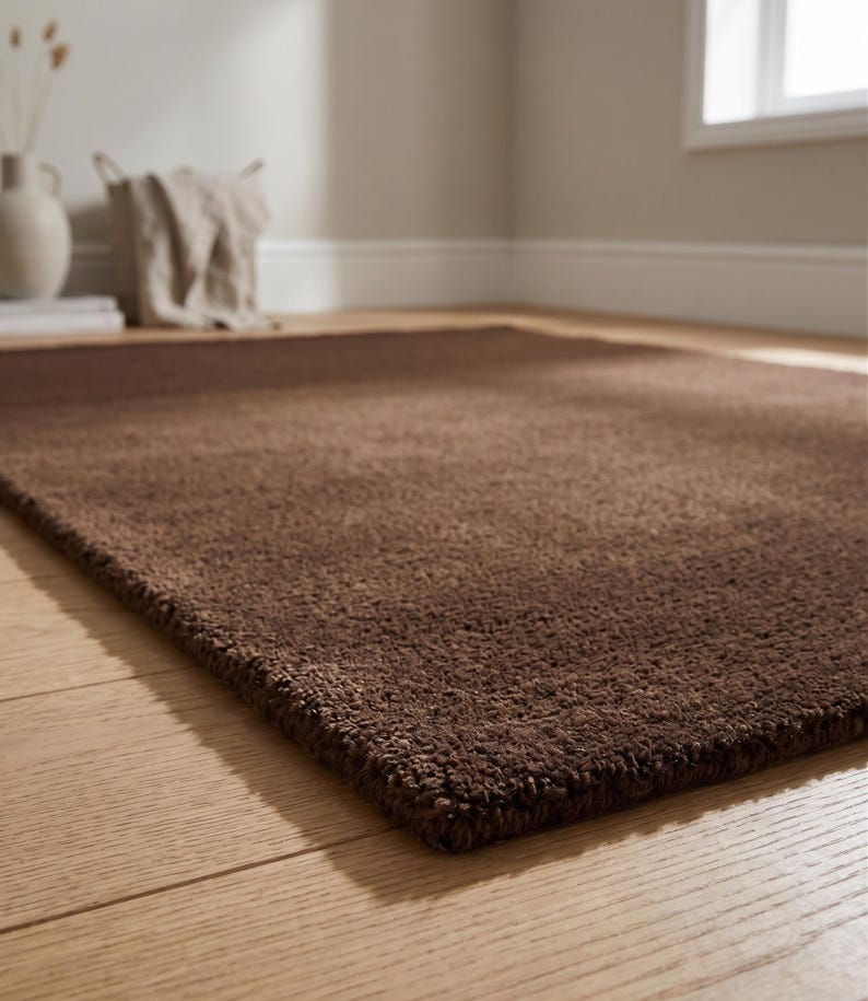 Detailed low-angle view showing the plush tufting, making it a mature, architectural alternative to busy traditional navajo rugs.