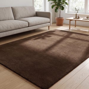 Close-up on the natural dyes capturing the deep, rich brown tones under natural light, showcasing why this solid foundation is a favorite among collections of fun rugs.