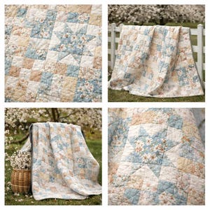May include: A patchwork quilt with a floral star pattern in shades of blue, cream, and tan. The quilt is displayed outdoors, draped over a white fence and a chair, and spread out on the grass.