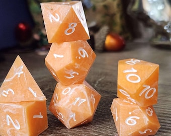 Creamsicle: Handmade Sharp Edge Polyhedral Dice Set for use in DnD and ttrpgs.