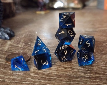 Dark Fade - Sapphire: A MINIATURE set of handmade resin polyhedral sharp edge dice for use in DnD and ttrpgs.