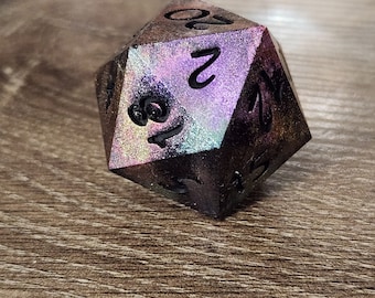 Oil Slick - Surface Spill:  Single d20 chonk for use in DnD and ttrpgs.