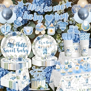May include: A baby shower party supply set featuring blue and white themes, including plates with 'Hello Sweet baby' and 'It's a Boy' text, napkins, cups, balloons, a cake topper, and various baby-themed cutouts like a carriage and pacifier.