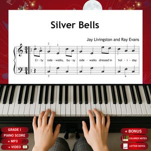 Può includere: Spartito per pianoforte di "Silver Bells" di Jay Livingston e Ray Evans, con spartito e il testo "City sidewalks, busy sidewalks dressed in holiday." L'immagine mostra una tastiera di pianoforte con le mani che suonano.