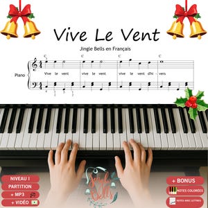 May include: A piano keyboard with sheet music for "Vive Le Vent" (Jingle Bells in French). The music sheet is above the keyboard, with the title in large black letters. The image includes hands playing the piano and decorative elements.