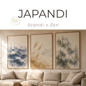 Könnte beinhalten: Drei gerahmte Kunstdrucke mit Aquarell-Landschaftsszenen. Die Drucke zeigen eine Meereslandschaft mit blauen Wellen, hohem Gras und einem nebligen Wald. Die Rahmen sind hellbraun, und der Text "Japandi" und "Scandi x Zen" steht oben.