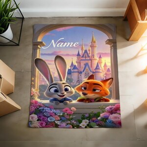 May include: A rectangular rug with a cartoon image of a bunny and a fox looking out a window at a castle. The rug has a floral border with the word "Name" above the characters. The background shows a sunset.
