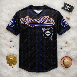 May include: Black baseball jersey with the text "Straw Hats" in purple and white. The jersey has a pattern of anchors, musical notes, and bones. It features a skull and crossbones on the sleeves and a skull emblem on the front.