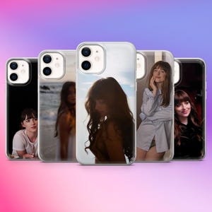 May include: A set of three ceramic mugs with a speckled, matte finish in cream, light grey, and dark grey. Each mug has a simple, minimalist design and a rounded handle.