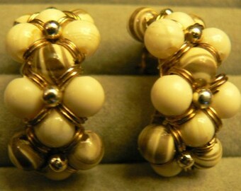 vintage jewels ...  golf toned EARRINGS with Bone and Tiger striped PEARLS and gold wrap clips ...