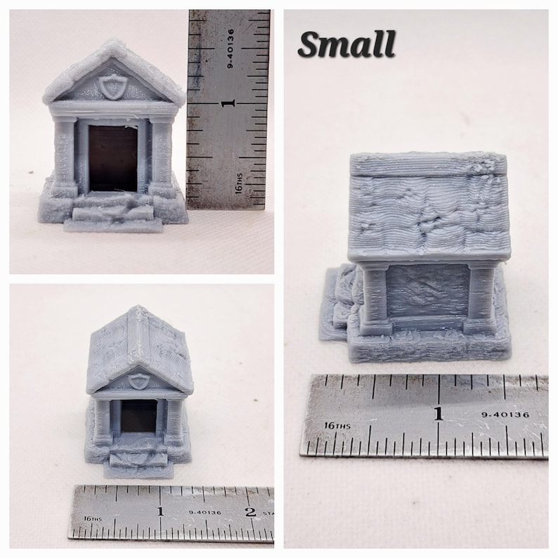 May include: Three gray miniature crypts are displayed, each with a detailed architectural design. The crypts have a rectangular shape with a pitched roof and a small door. The word "Small" is written in black text. Measurements are shown in inches.