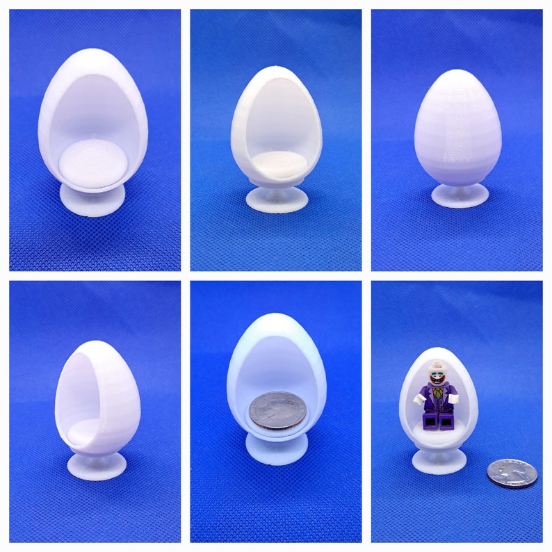 May include: A set of five white plastic miniature egg-shaped chairs. One chair has a miniature person sitting in it.