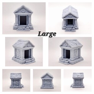 May include: A collection of gray miniature mausoleums with detailed architectural features, including steps, columns, and a peaked roof. The word "Large" is printed in black. These models are suitable for tabletop gaming or display.