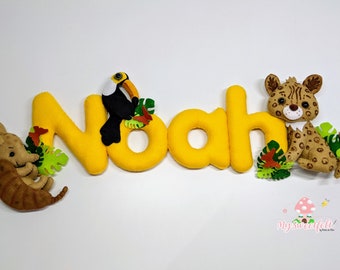 A cute name banner for your baby's nursery with  Amazonian animals