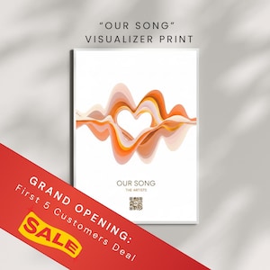 May include: A white framed print with the text "OUR SONG" and a visualizer design in shades of orange and peach forming a heart shape. The print also includes the text "OUR SONG" and "THE ARTISTS".