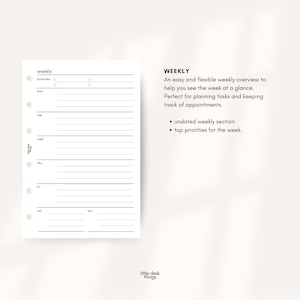 May include: A white weekly planner insert with a minimalist design. The planner includes sections for priorities and daily scheduling, with the days of the week labeled. The text "WEEKLY" is at the top, along with bullet points describing the planner's features.