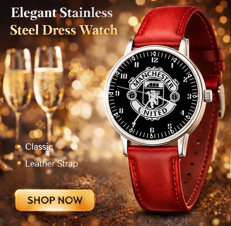 May include: Stainless steel dress watch with a black face featuring the Manchester United logo. The watch has a silver bezel and a red leather strap. The image also includes text that says "Elegant Stainless Steel Dress Watch" and "Classic Leather Strap".