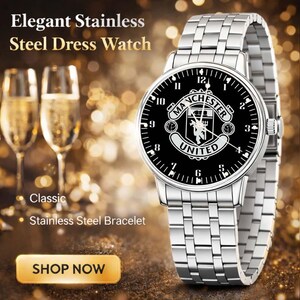 May include: A stainless steel dress watch with a black face featuring the Manchester United logo. The watch has a silver-colored stainless steel bracelet and a classic design. The image also includes text that says "Elegant Stainless Steel Dress Watch" and "Stainless Steel Bracelet".