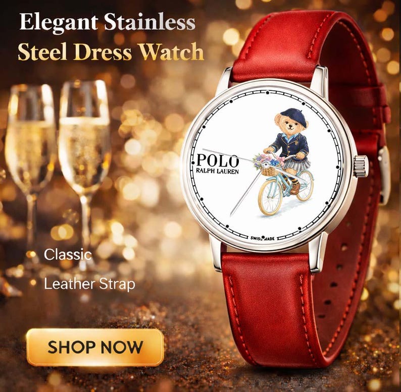 May include: Elegant stainless steel dress watch with a red leather strap. The watch face features a Polo Ralph Lauren design with a bear riding a bicycle. The watch has a classic design.