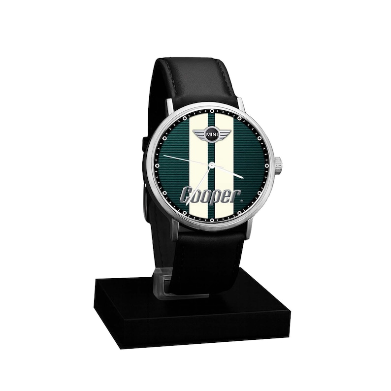 May include: A black leather-banded watch with a silver case. The watch face is dark green with two white vertical stripes and the word "Cooper" in white. The watch has the Mini logo and is displayed on a black stand.