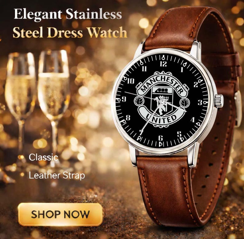 May include: Stainless steel dress watch with a brown leather strap. The watch face is black with white numerals and the Manchester United logo. The image also includes text that says "Elegant Stainless Steel Dress Watch" and "Classic Leather Strap".